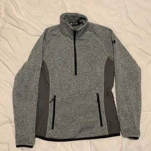 Helly Hansen sweater with pockets and zipper.